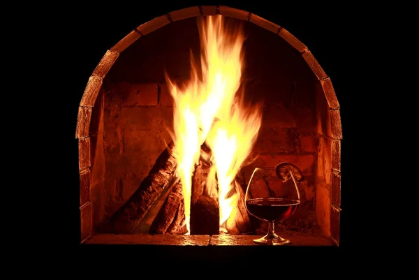 Fireplace grape cognac lemon — Stock Photo, Image