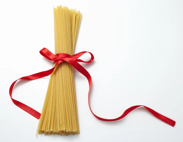 stock image Spaghetti and red bow.