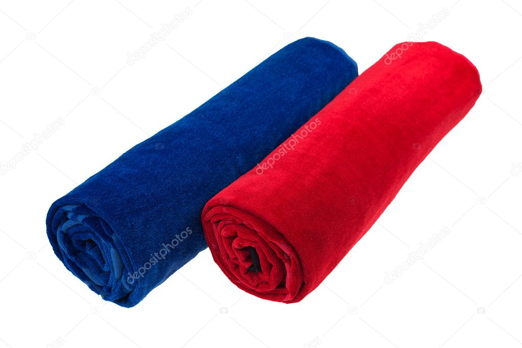 Two blue and red rolled up beach towel isolated