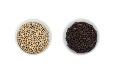Black and white peppercorn in a cup isolated on background clipart