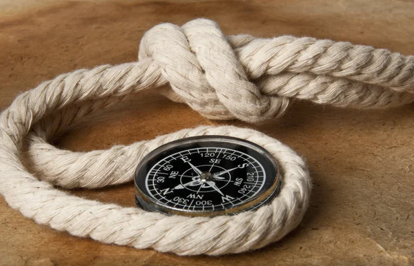 Морська мотузка і компас Ліцензійні Стокові Фото