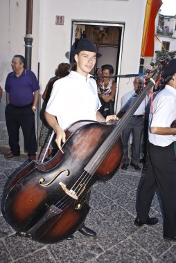 Hungarian folk group. men with double bass clipart