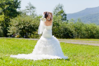 Bride at green grass clipart