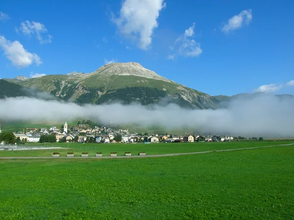A town in clouds — Stock Photo, Image