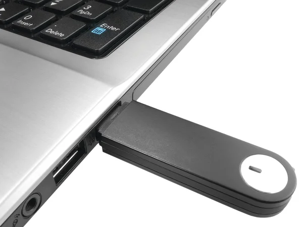 Unidade USB isolada em um laptop — Fotografia de Stock