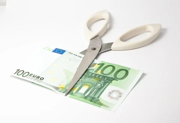 Cut the big euro — Stock Photo, Image