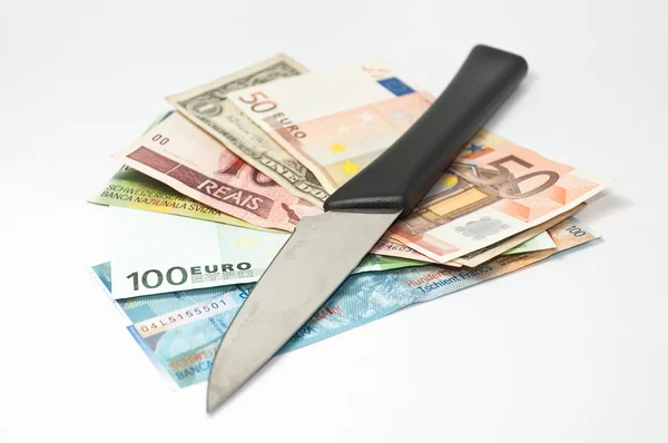 Knife and banknotes — Stock Photo, Image