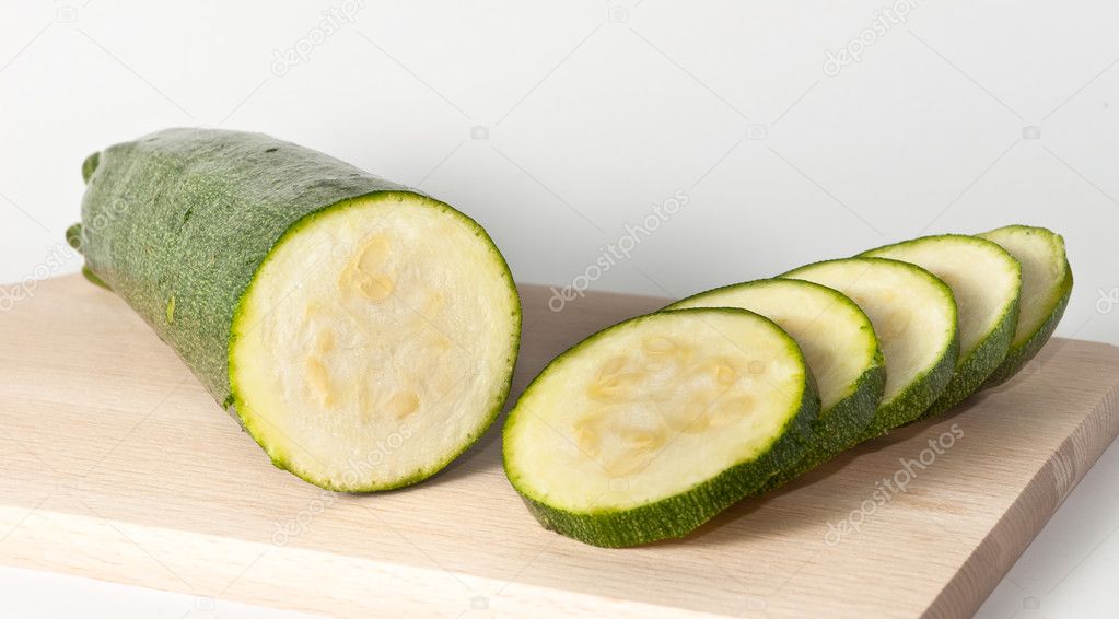 Sliced courgette on a cutting board