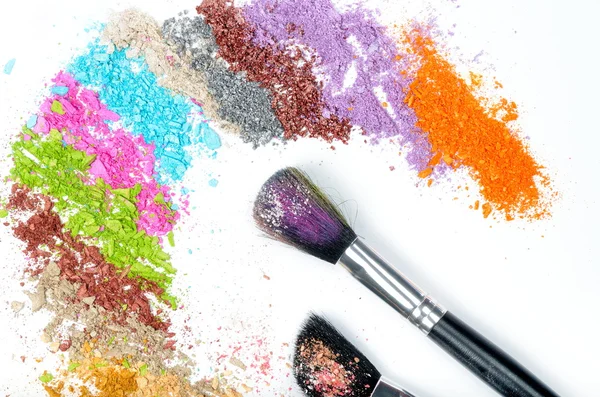 Professional make-up brush on colorful crushed eyeshadow — Stock Photo, Image
