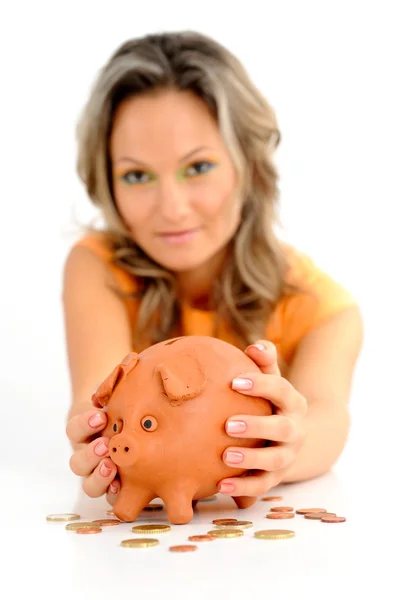 Young woman with in piggy bank — Stock Photo, Image