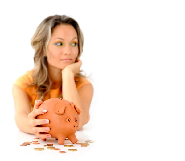 Young woman with in piggy bank — Stock Photo, Image