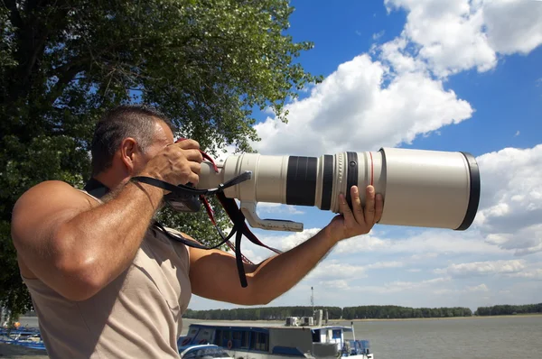 Professional photographer outdoor — Stock Photo, Image