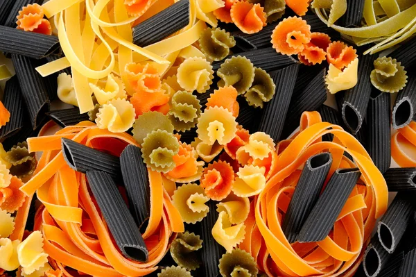 Stock image Colorful uncooked pasta