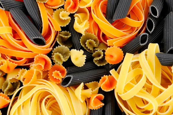 stock image Colorful uncooked pasta