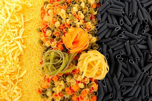 stock image Colorful uncooked pasta