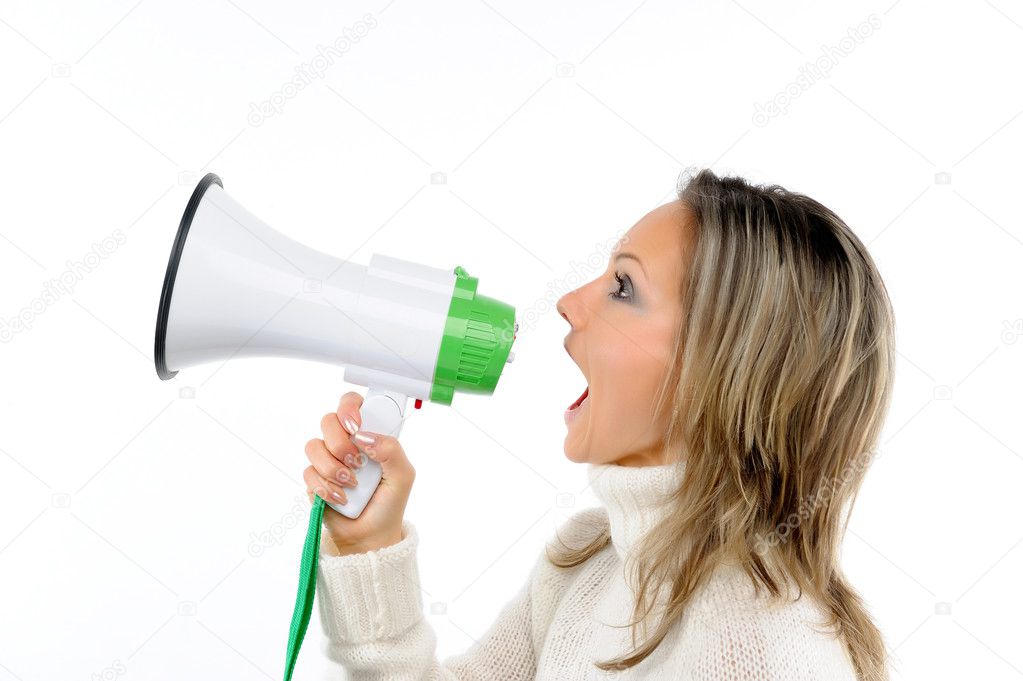 Young woman speaking through megaphone — Stock Photo © bereta 9549616