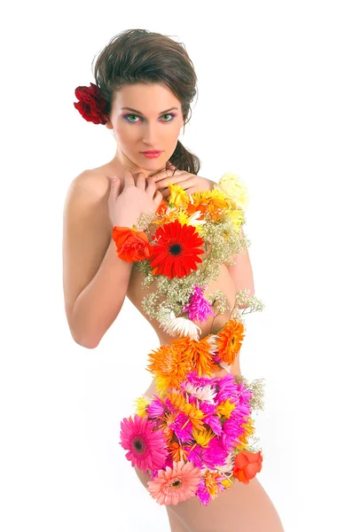 Gyönyörű fiatal nő, tavaszi virágok — Stock Fotó