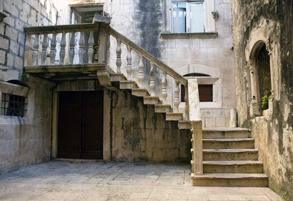 A beautiful architecture on Korcula island in Croatia. Stairway outside building.