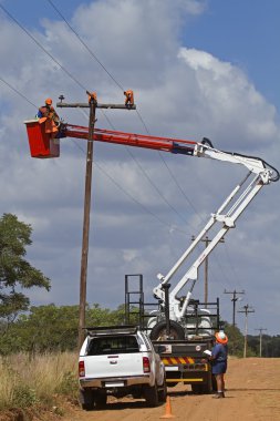 Linemen at work clipart