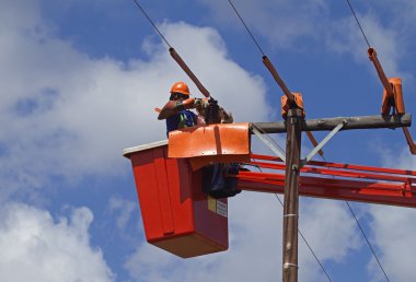 Linemen at work clipart