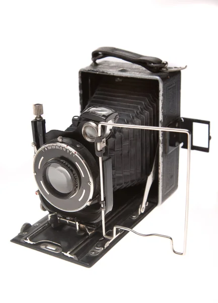 Old camera on a white background Stock Photo