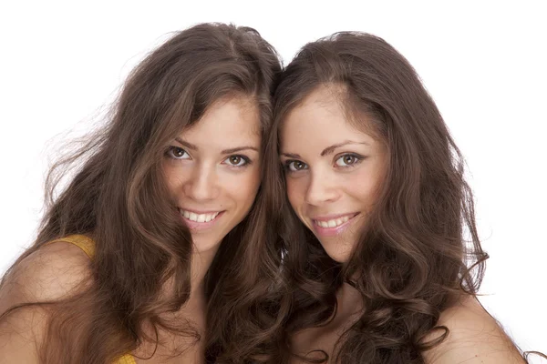 Two girls sisters - GEMINI on a white background — Stock Photo, Image