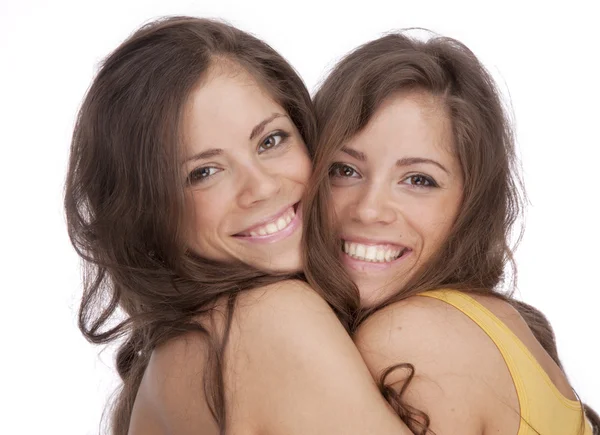 Two girls sisters - GEMINI on a white background — Stock Photo, Image