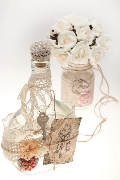 Buketter och flaskor på en vit bakgrund — Stockfoto