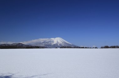 Snow field and Mt.Iwate clipart