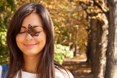 Girl with a butterfly clipart