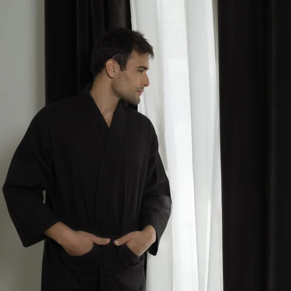 stock image Handsome man in a bathrobe