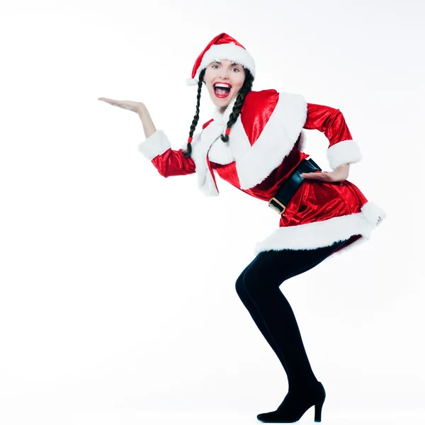 Молода смішна і виразна жінка, одягнена як Санта Клаус робить її покупки — стокове фото