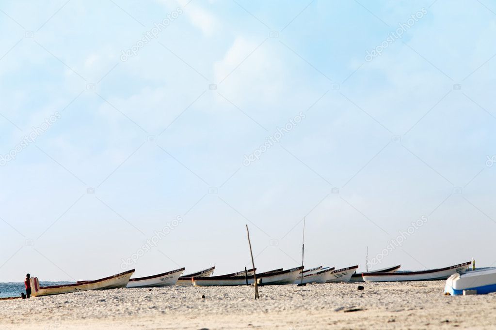 Boats on the beach of tulum