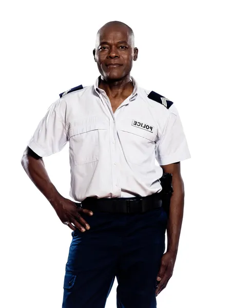 Portret policjanta z ręki na pasie — Zdjęcie stockowe