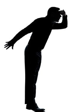 One business man silhouette tiptoe looking away clipart