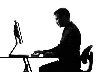 Silhouette serious man computing computer clipart