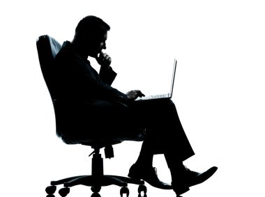 One business man computer computing sitting in armchair silhouet clipart