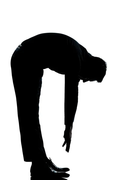 Silhouette man stretching back full length — Stock Photo, Image