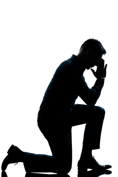 Silhouette man kneeling full length — Stock Photo, Image