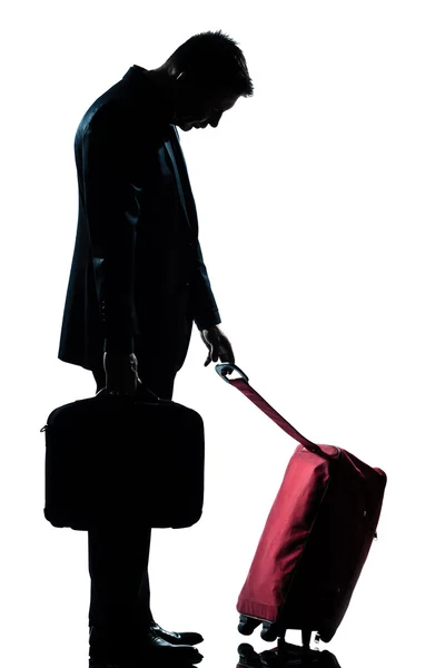 Caucasian business traveler man tired with suitcase — Stock Photo, Image
