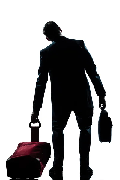 Zmęczony podróżny biznesmen kaukaski z walizką — Zdjęcie stockowe