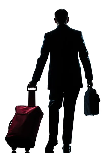Business traveler man walking with suitcase rear view — Stock Photo, Image