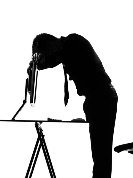 Sylwetka człowieka computing zmęczony smutny — Zdjęcie stockowe