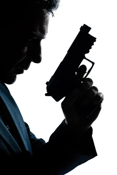 Retrato de homem silhueta com arma — Fotografia de Stock