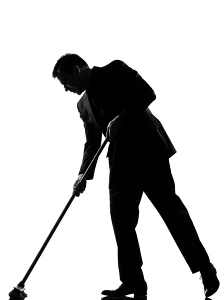 Silhouette man wiping brooming — Stock Photo, Image