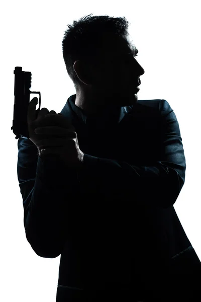 Silueta hombre retrato con pistola — Foto de Stock