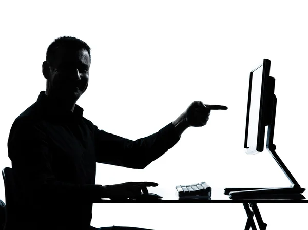Один бізнесмен силует комп'ютерних обчислень вказує жест — стокове фото