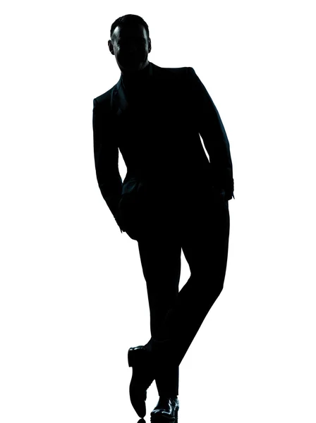 Bir iş adamı ayakta tam uzunlukta cep siluet eller — Stok fotoğraf
