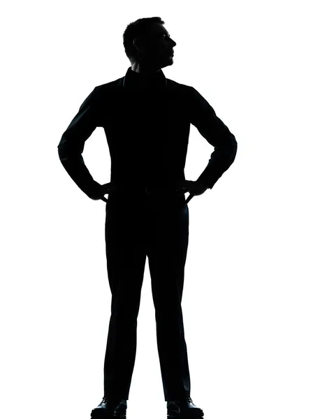 Un homme d'affaires debout mains sur la silhouette des hanches — Photo