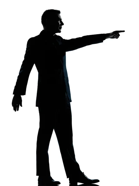 Un uomo d'affari poiting silhouette — Foto Stock